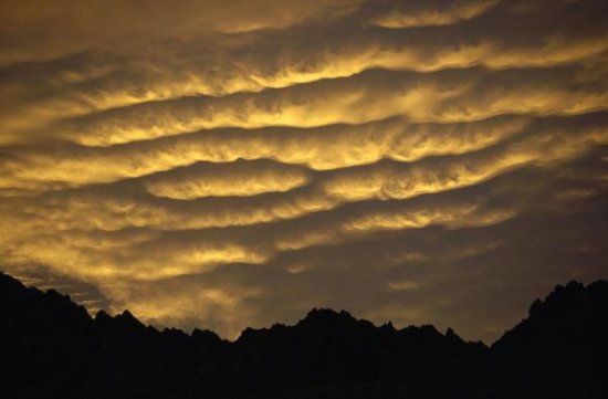 Cumulonimbus Clouds at Dawn above Norwest Arch, Ben Ohau Range, Southern Alps, New Zealand