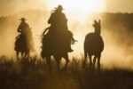 Cowboys Herding Horses at Dusk, Oregon
