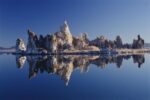 Mineral Tufa Formations Reflected in Mono Lake, California