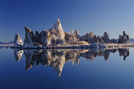 Mineral Tufa Formations Reflected in Mono Lake, California