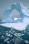 Iceberg with Arch, Petermann Island, Antarctic Peninsula, Antarctica