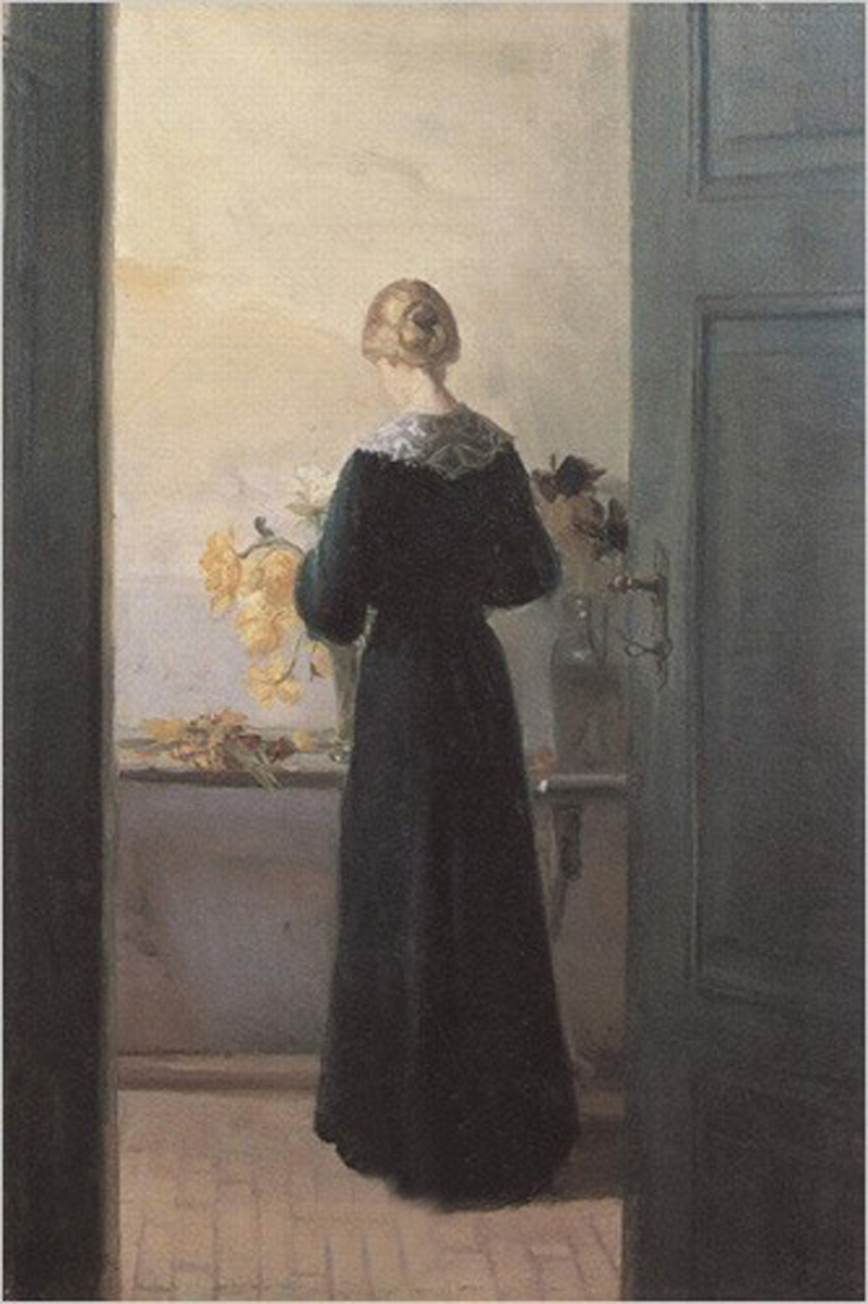 A Young Girl Arranging Flowers