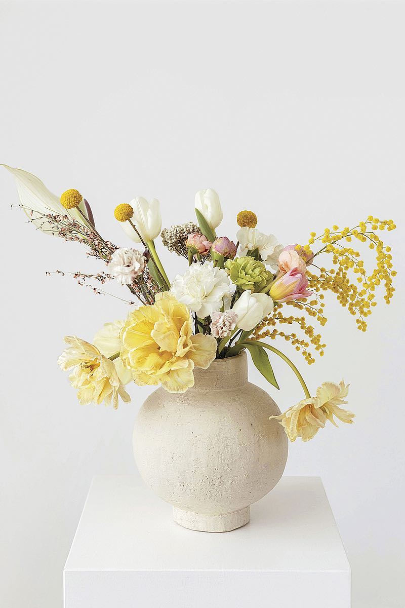 Flowers in a White Vase