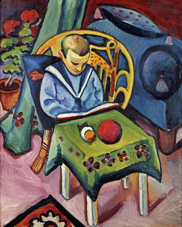 A Young Boy with Books and Toys