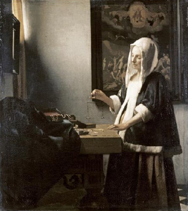 Woman Holding a Balance